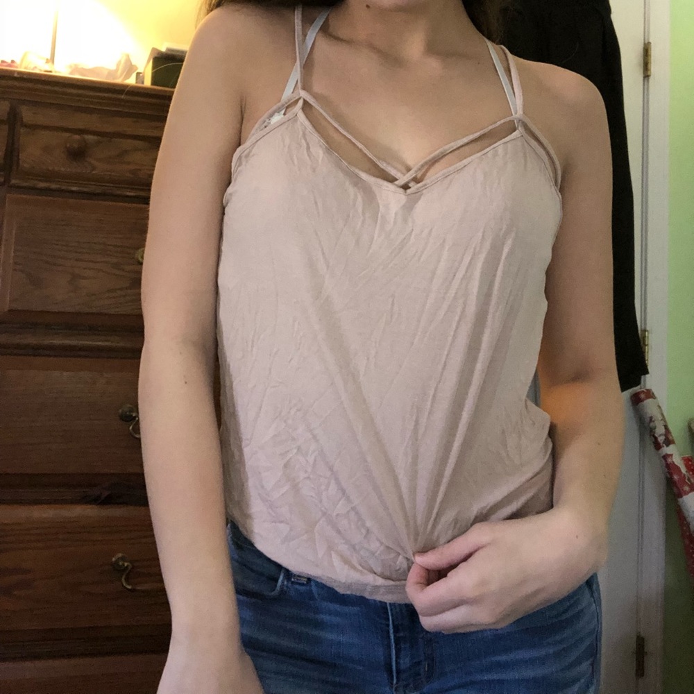 nude pink tank top.